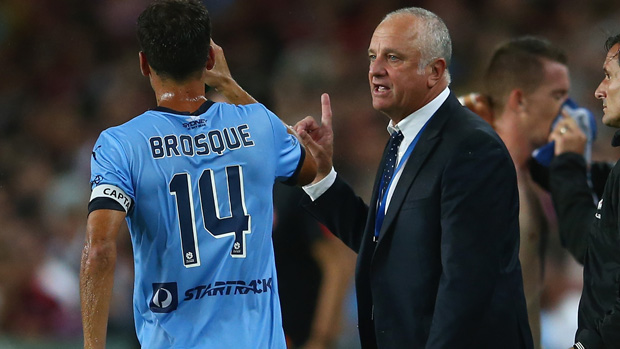Graham Arnold gives instructions to Sky Blues striker Alex Brosque.