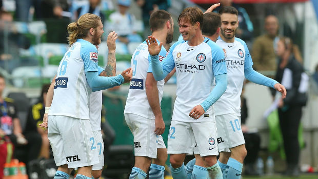 Melbourne City players celebrate Nick Fitzgerald's goal against the Phoenix in Round 8.