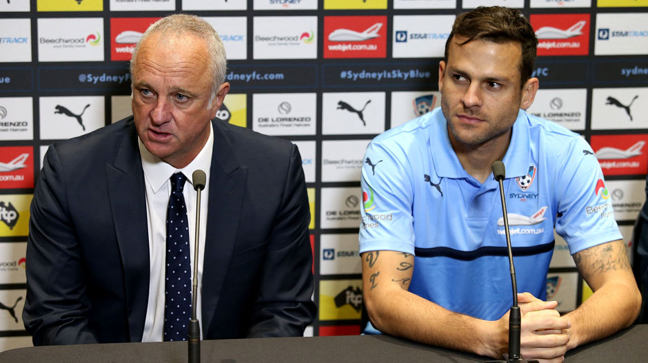 Coach Graham Arnold and Bobo take questions from the media at his signing press conference.