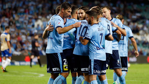 Sydney FC players celebrate a goal in their Round 27 win over Newcastle Jets.