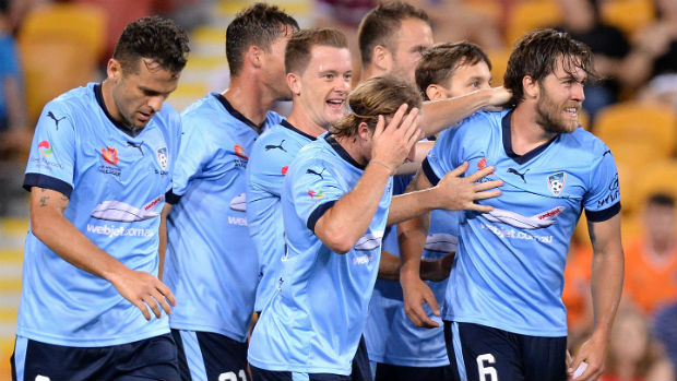 Josh Brillante celebrates scoring his first professional goal with Sydney FC teammates.