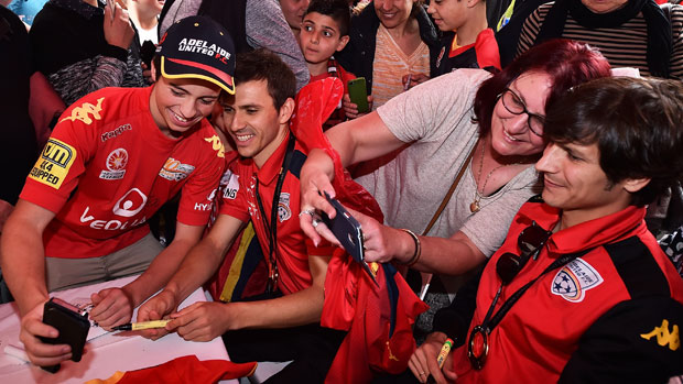 Adelaide fans with players