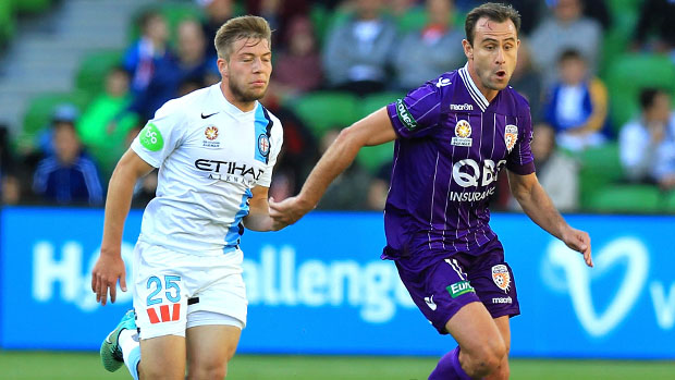 Melbourne City FC midfielder Jacob Melling challenges for the ball with Glory forward Richard Garcia.