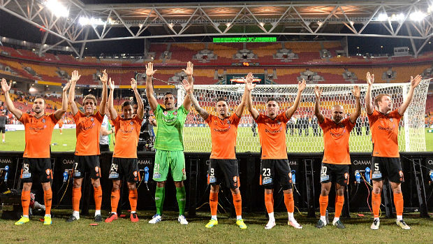 Brisbane Roar players celebrate last season's Elimination Final win at Suncorp Stadium.