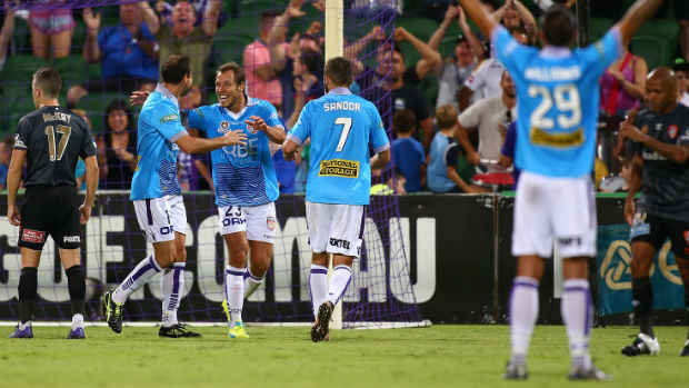 Perth Glory celebrate Richard Garcia's goal against Brisbane on Saturday night.