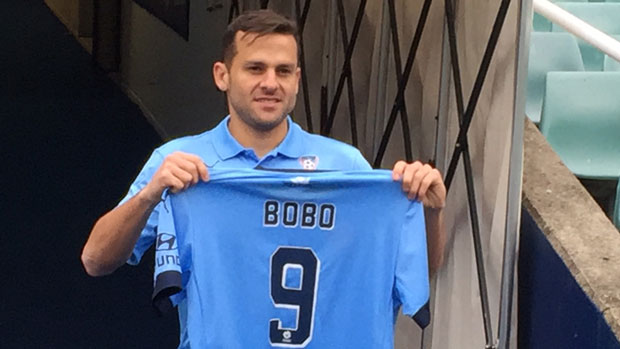 Bobo with his new Sydney FC number 9 jersey at Allianz Stadium.
