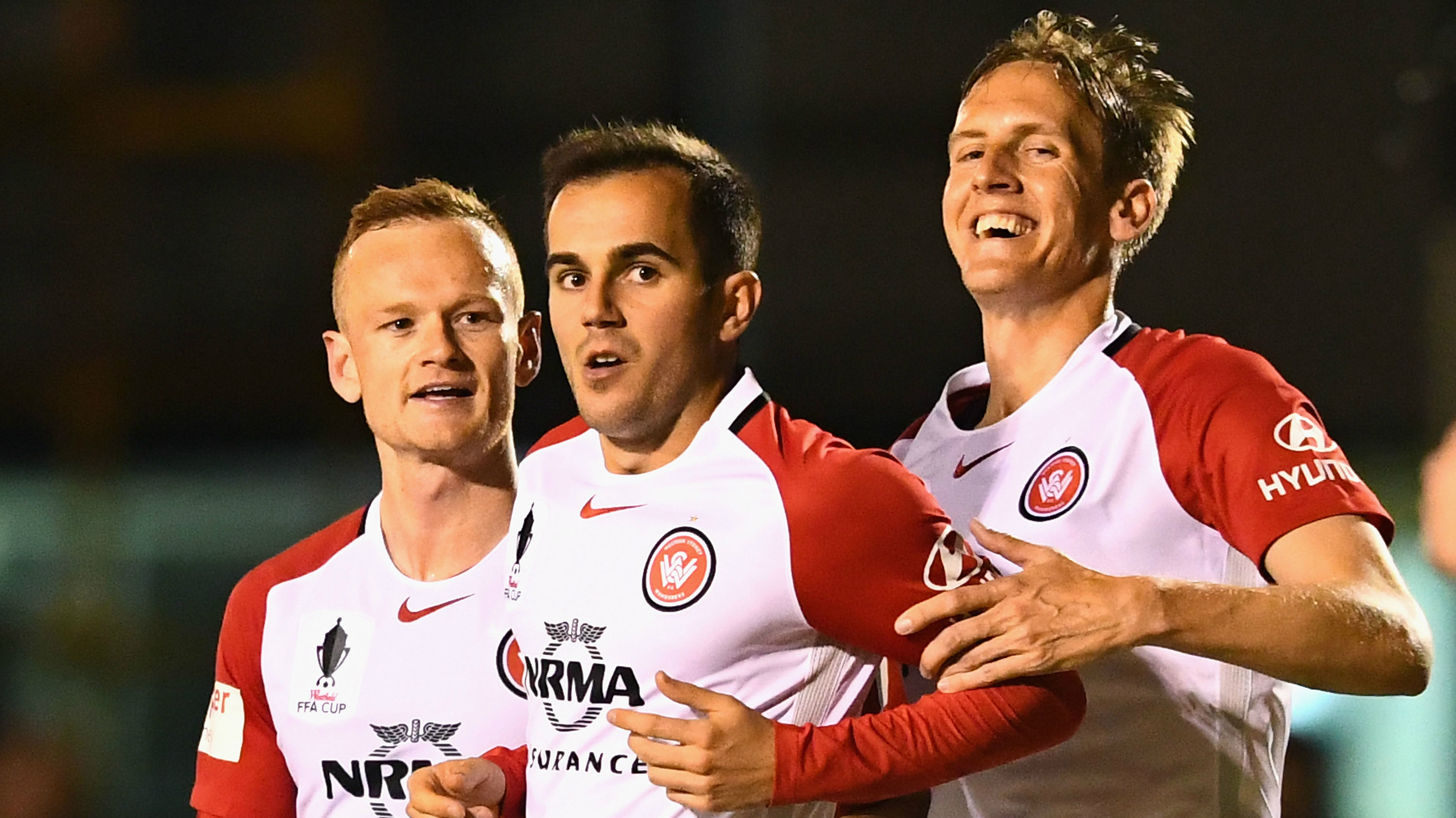 Wanderers players celebrate one of their four goals in the big win over Bentleigh Greens.