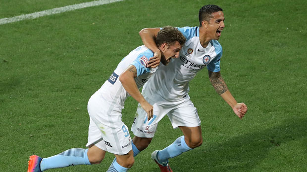 Tim Cahill celebrates with Nicolas Colazo after scoring in Melbourne City's win over Adelaide United.