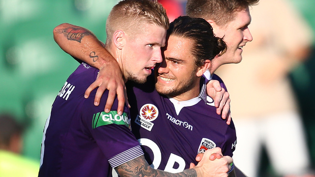 Andy Keogh celebrates with Josh Risdon after opening the scoring against the Jets.