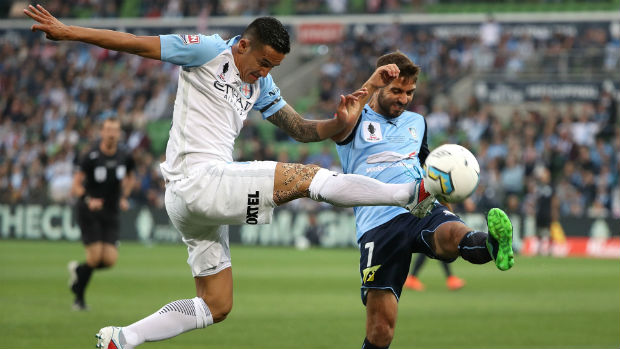 Tim Cahill and Michael Zullo stretch for the ball in last week's Westfield FFA Cup Final.