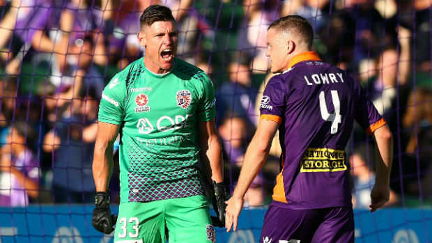Glory goalkeeper Liam Reddy reacts to saving a first-half penalty against Victory at nib Stadium on Saturday night.