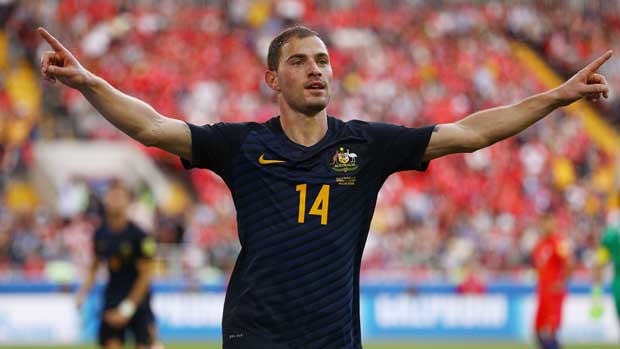 James Troisi wheels away to celebrate after giving the Caltex Socceroos the lead against Chile.