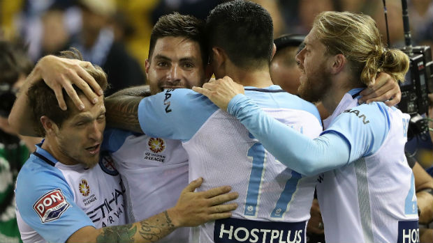 Melbourne City players celebrate scoring in the Round 2 Melbourne Derby.