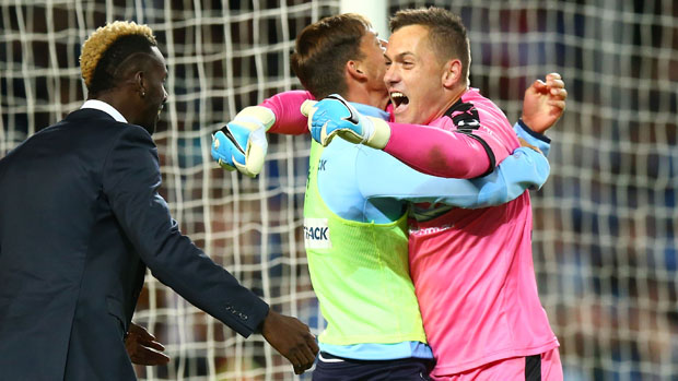 Danny Vukovic celebrates with teammates after Sydney FC's Grand Final win over Melbourne Victory.