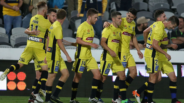 Mariners players celebrate a goal in their 2-0 win over Perth Glory.
