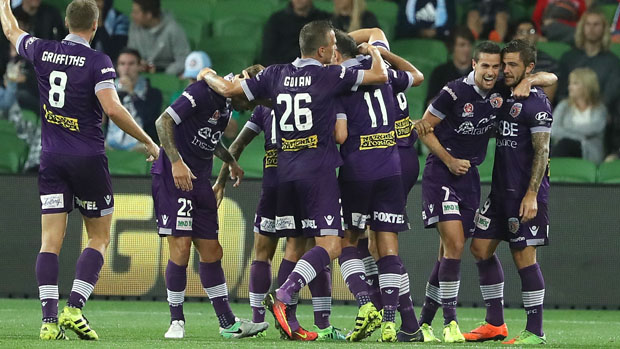 Perth Glory players celebrate Joel Chianese's goal in their 2-0 win over Melbourne City.