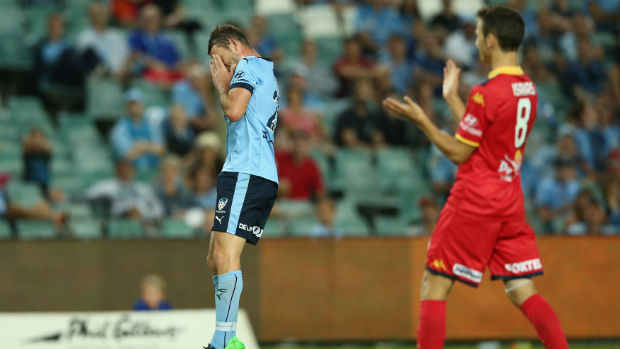 Sydney FC defender Alex Mullen reacts to an Adelaide goal at Allianz Stadium.