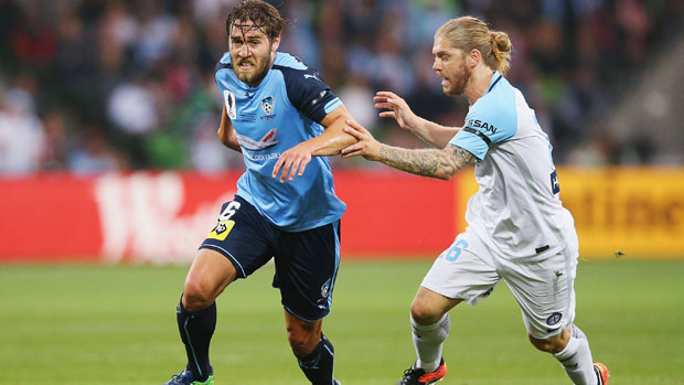 Sydney FC midfielder Josh Brillante and City playmaker Luke Brattan fight for the ball in the FFA Cup Final.