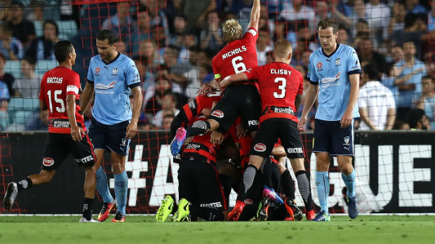 The Wanderers celebrate Brendon Santalab's winner against the Sky Blues at ANZ Stadium.