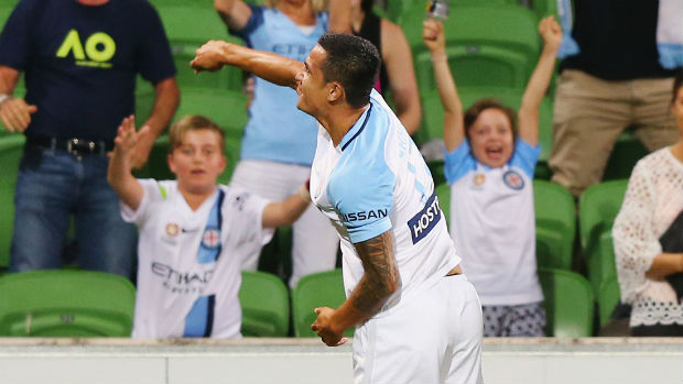 City striker Tim Cahill celebrates opening the scoring against the Jets at AAMI Park on Saturday night.