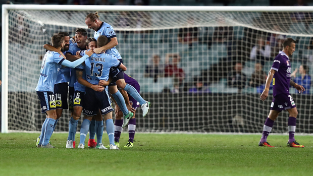 Sydney FC players celebrate after Josh Brillante's opening goal in their big semi final win over Perth Glory.