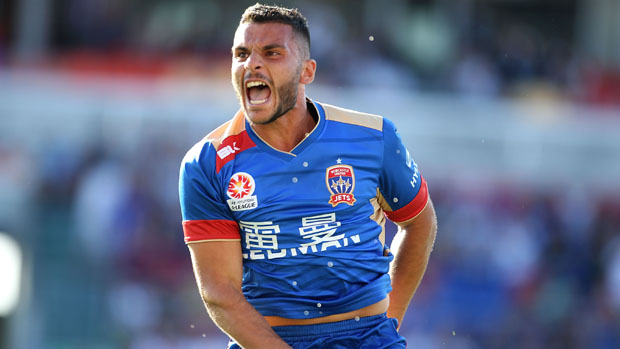 Andrew Nabbout celebrates after Newcastle Jets opened the scoring against the Roar.