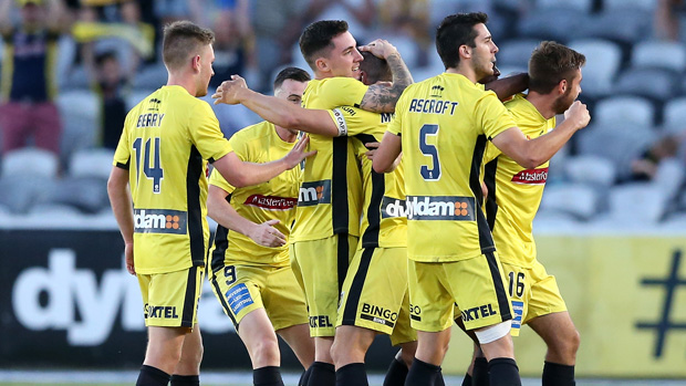 Mariners players celebrate a goal in their 2-0 win over Newcastle Jets on Sunday afternoon.