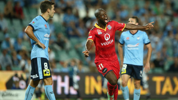 Adelaide striker Bruce Djite celebrates scoring against Sydney FC at Allianz Stadium.